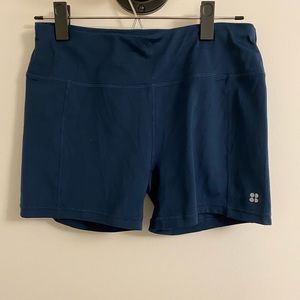 Sweaty Betty beetle blue all day biker shorts